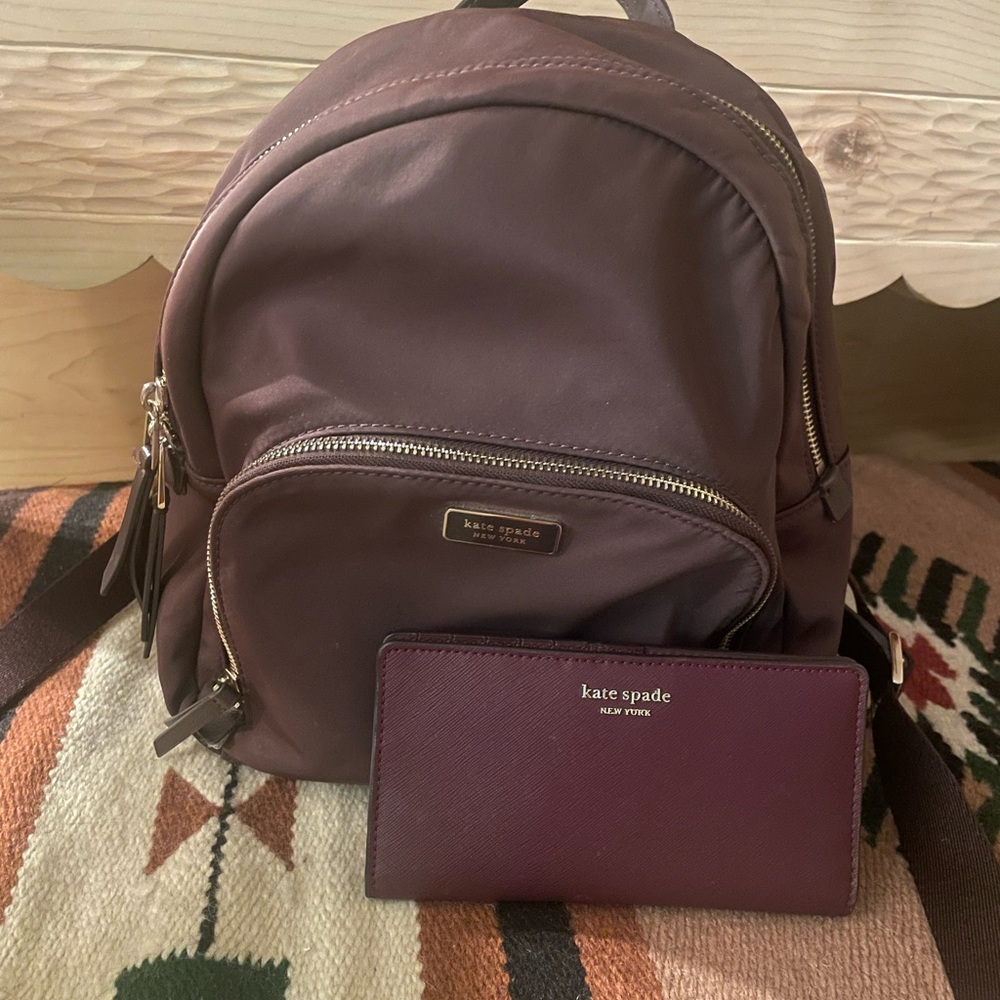 Kate Spade burgundy backpack and wallet.